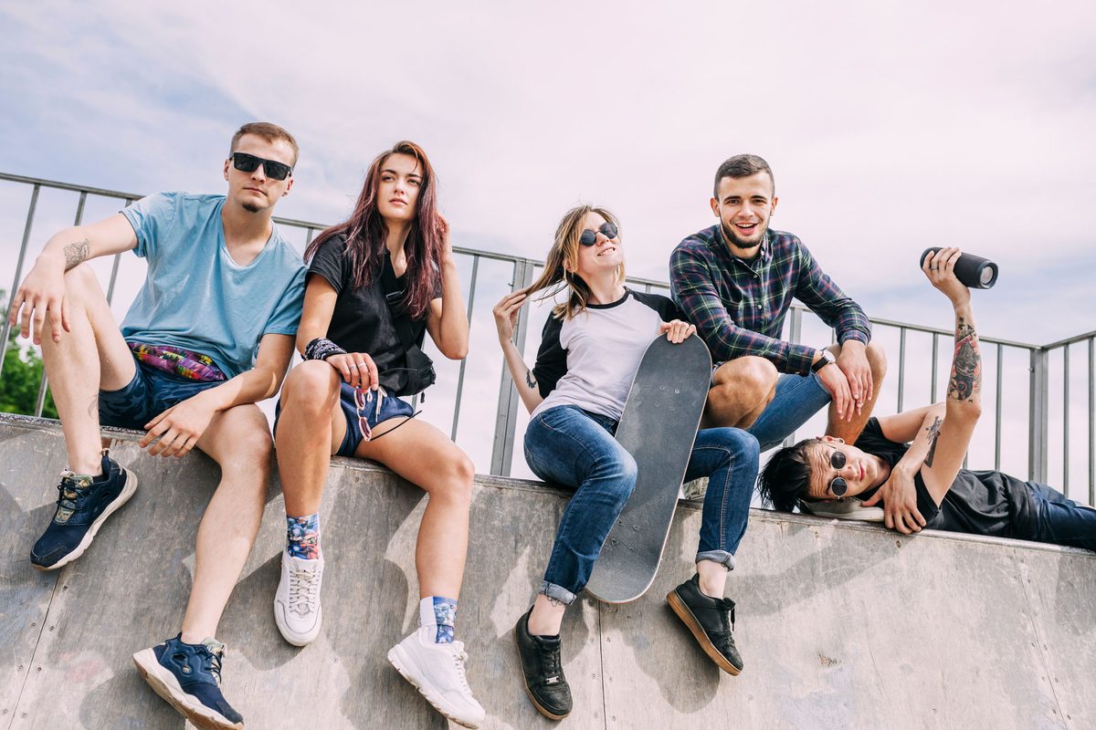 A group of friends relaxing on a rooftop terrace